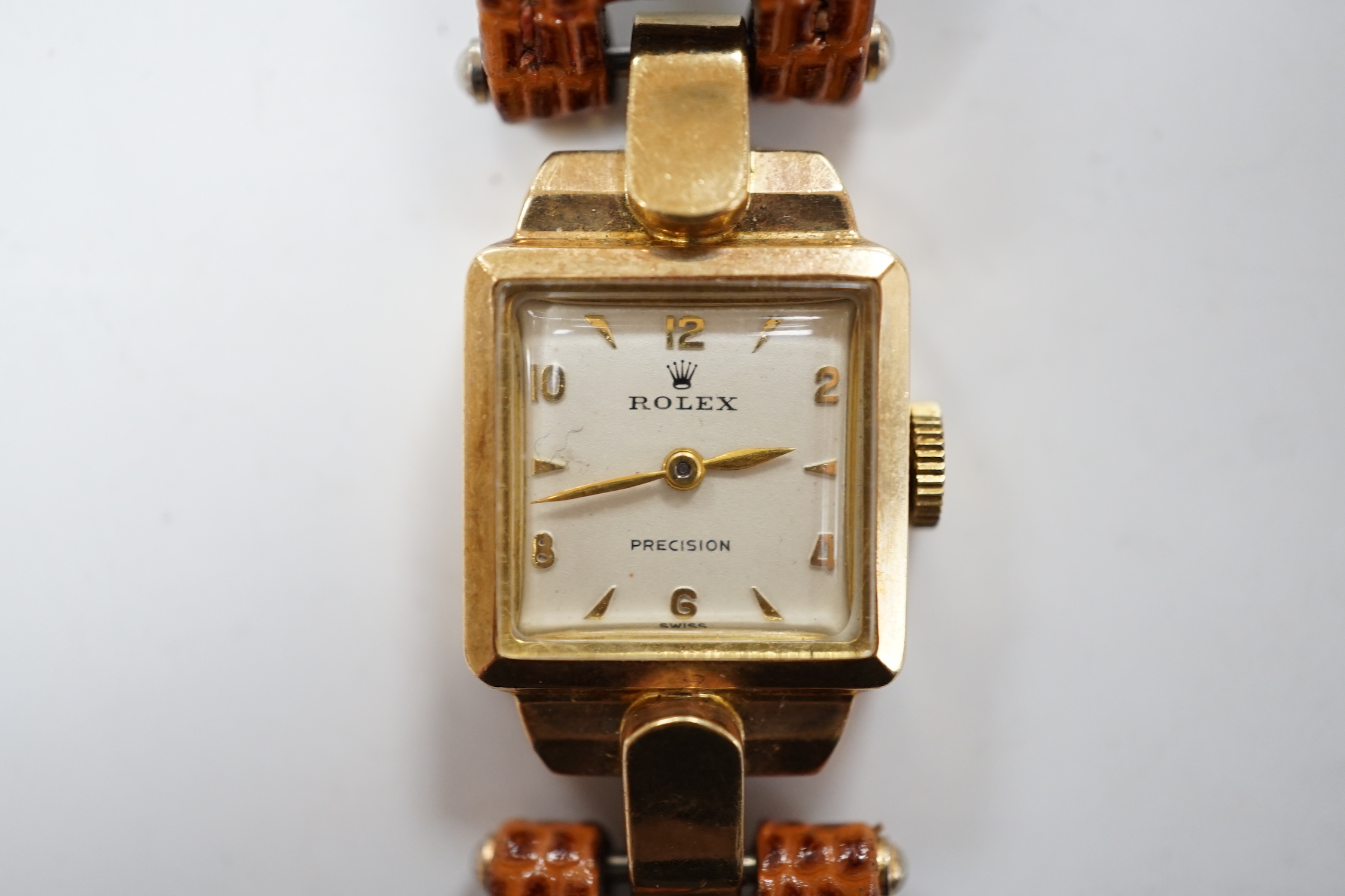 A lady's 1950's 9ct gold Rolex manual wind wrist watch, on later associated leather strap.
